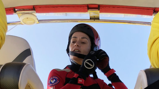 Fiona Phelps prepares to jump in the water to demonstrate a sea based rescue. 