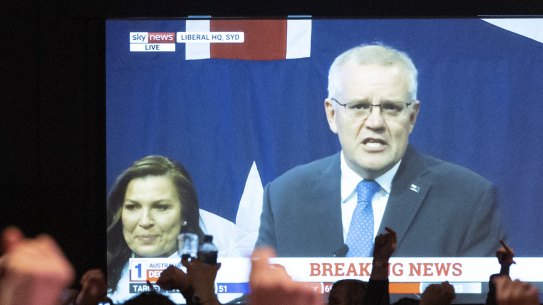 Labour supporters cheer as Scott Morrison concedes defeat in the May federal election.