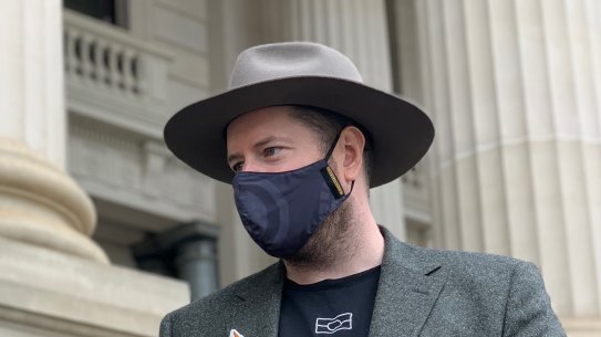 Minister for Aboriginal Affairs Gabrielle Williams receives the First Peoples’ Assembly annual report from Assembly Co-Chair Marcus Stewart on Thursday
