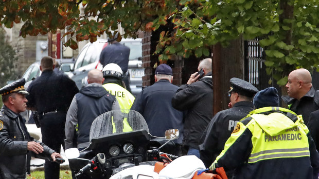 Emergency services rush to the scene of the shooting to help the wounded. 