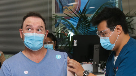 Tom Murray gets his booster jab in Homebush, Sydney, earlier this month.