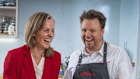 Deb Galle and Michael Weldon in the Coles test kitchen, working on a cacio e pepe recipe. 