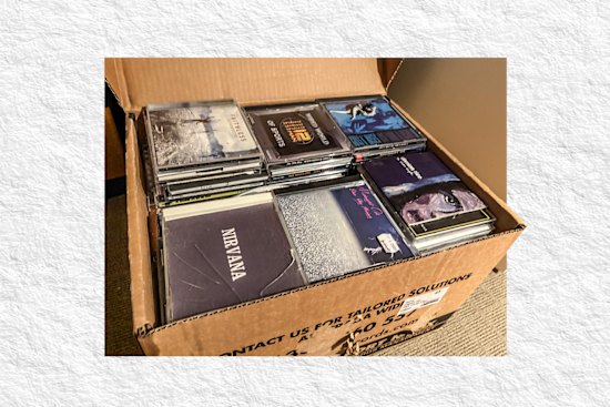 A box of CDs sit in our attic.