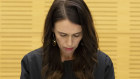 New Zealand Prime Minister Jacinda Ardern observes a moment of silence with her cabinet colleagues at the moment that a volcano erupted a week earlier.