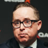 Former Qantas chief executive Alan Joyce had his pay wings clipped