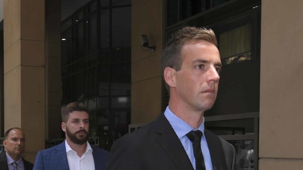 Police officers Florian Hilgart (left), John Edney and Brad McLeod outside court in 2019.