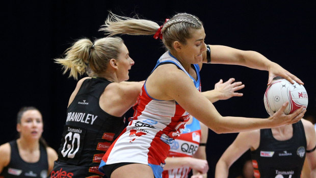 Sophie Garbin of the Swifts wins the ball against the Magpies earlier this season.