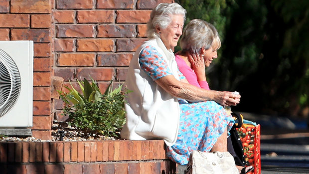 Residents are seen outside the Earle Haven Nursing Home following its shock closure.
