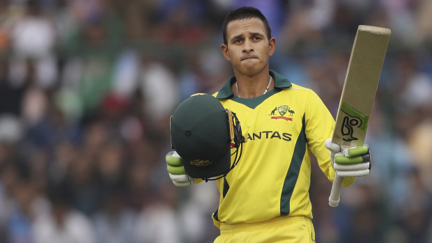 Usman Khawaja celebrates scoring a century during the final ODI against India in New Delhi in March.