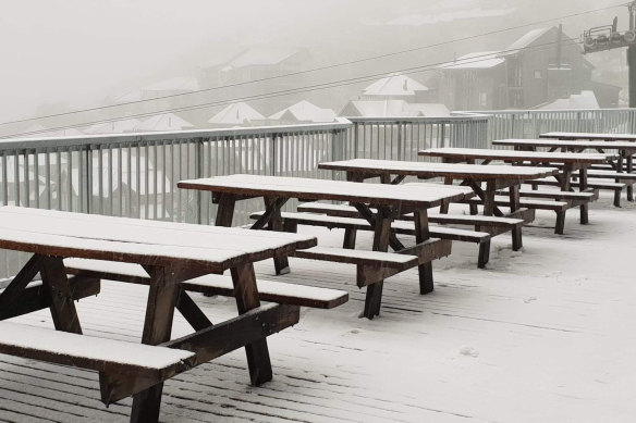 Snow blankets picnic tables at Mount Hotham in 2019. The weather bureau says snow in December is slightly more common than falls in January.