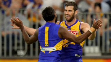 Jack Darling (right) celebrates with Liam Ryan, who was subject to racist abuse online during the week. 