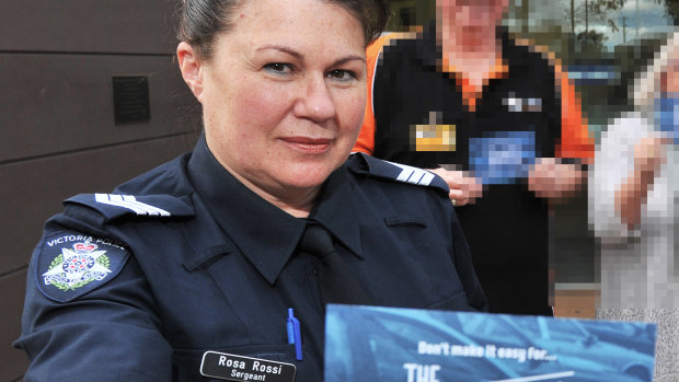 Sergeant Rosa Rossi handing out "Don’t make it easy for the Thankful Thief" brochures during a promotional event in Wyndham in 2016