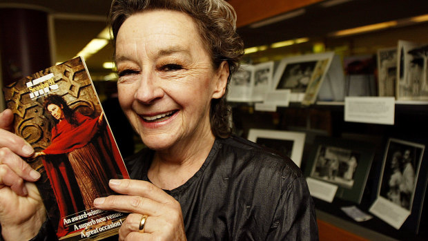 In 2003, actress Zoe Caldwell holds a pamphlet for the Melbourne Theatre Company's 1983 season.  Caldwell first performed for the MTC in 1953. The pamphlet was part of a 2003 exhibition at the Baillieu Library at Melbourne University celebrating MTC's 50th year.