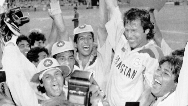 Victory: Pakistan's cricket captain Imran Khan, waving a Pakistan flag, after Pakistan defeated England in the World Cup Cricket final in Melbourne in 1992.