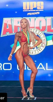 Monique Lezsak wins a bodybuilding competition.