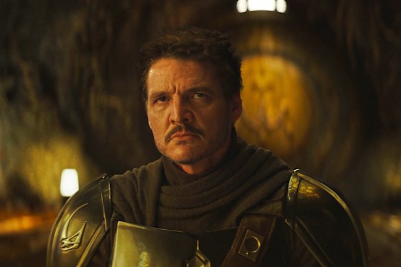 Pedro Pascal in a scene from Star Wars: The Mandalorian and Grogu.