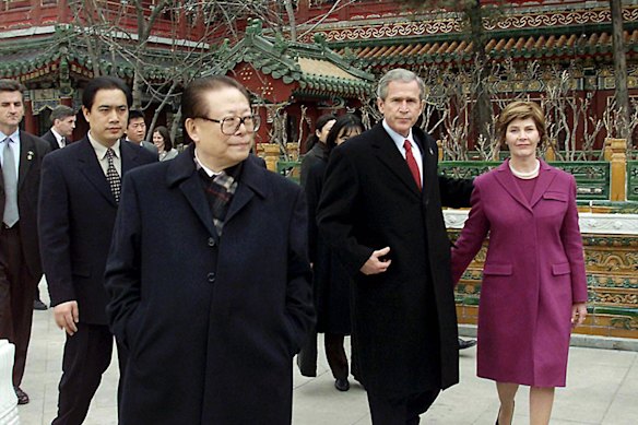 Former president George W. Bush and first lady Laura Bush visit Zhongnanhai as guests of Chinese president Jiang Zemin (third left) in 2002.
