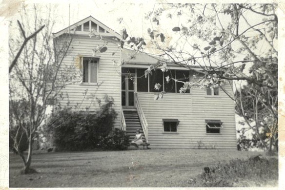 As a girl on the steps of Malabah House in Mooloolah, where the Davidson family moved to in 1954 .