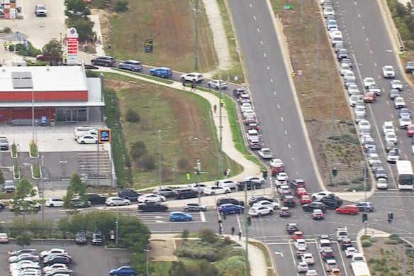 Cars lined up around the block to try and snag a free tank of fuel at the Liberty in Truganina. 