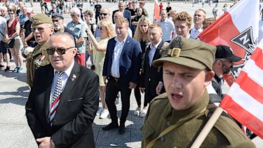 Polish officials and war veterans pay tribute to a World War II-era underground force that collaborated with the Nazi towards the end of World War II.