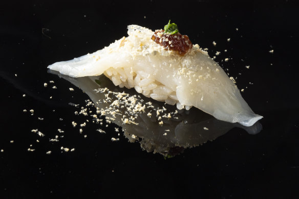 Supplementary nigiri of fugu (puffer fish) with foie gras shavings.