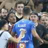 Marseille’s Alvaro Gonzalez confronts Nice supporters.