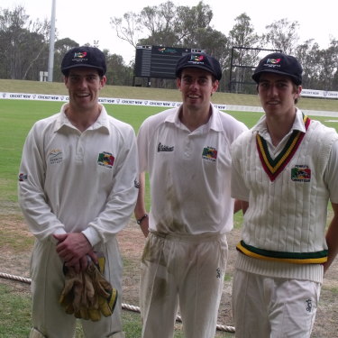 Pat (at right) with his brothers Matt and Tim in 2010.