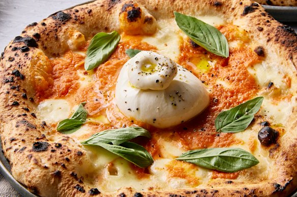 Making the dough ahead improves the crust of this burrata pizza with vodka sauce.