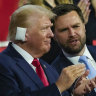 ‘Our God still saves’: A bandaged Trump makes triumphant entrance to Republican convention