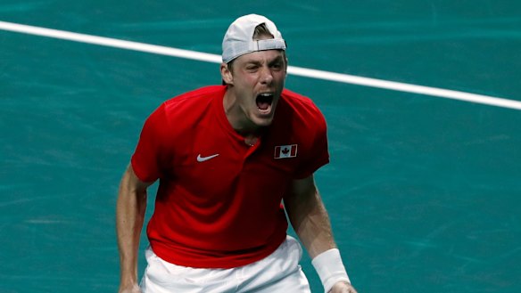 Canada’s Denis Shapovalov celebrates after defeating Thanasi Kokkinakis.
