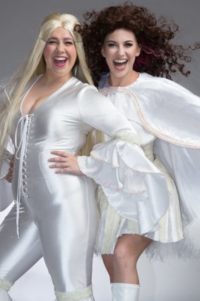 Muriel (Natalie Abbott ) and Rhonda (Stefanie Jones) are back in town for Muriel's Wedding the Musical. 