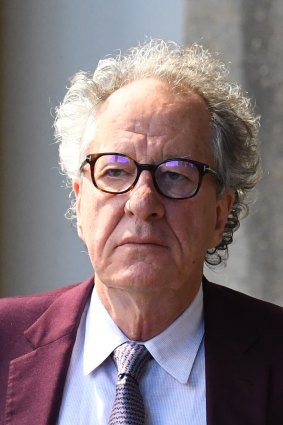Geoffrey Rush arrives at court. 