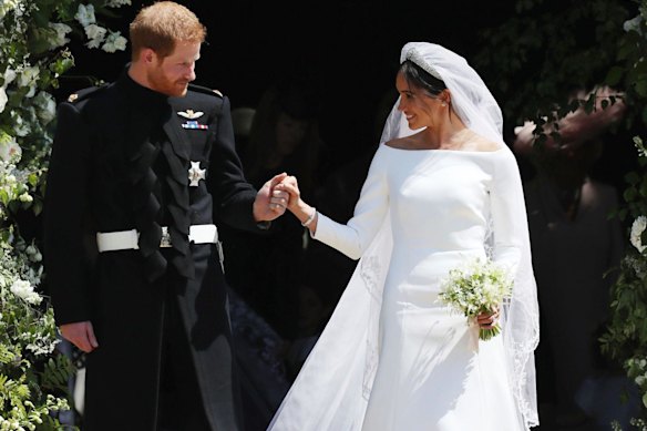 Meghan Markle and Prince Harry walk down the steps of St George's Chapel at Windsor Castle on their wedding day in 2018.