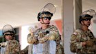 Members of the National Guard protect a metropolitan detention centre in Los Angeles.