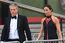 Actor Hugh Grant and his wife Anna Elisabeth Eberstein spotted entering the arena. 