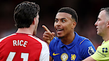 Morgan Rogers of Chelsea reacts with Declan Rice of Arsenal.