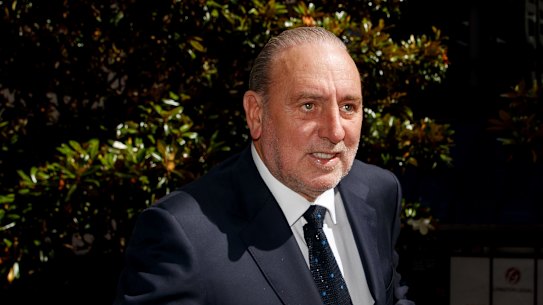 Brian Houston arrives at the Downing Centre local court on Wednesday.