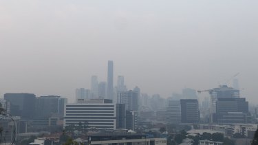A smoke haze blankets Brisbane CBD on Monday morning.