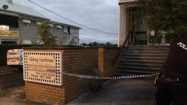 Adalong Guesthouse in South Brisbane is under police guard after a request from Queensland Health on Monday night.