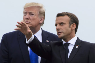 US President Donald Trump is greeted by President of France Emmanuel Macron as he arrives to the G7 Summit in Biarritz, France.
