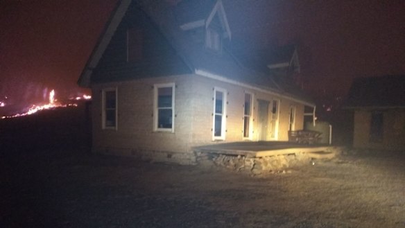 Fire in the bush behind Richard Glover's house.