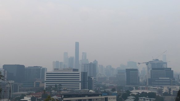 A smoke haze blankets Brisbane CBD on Monday morning.