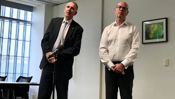 AAP chairman Campbell Reid and CEO Bruce Davidson announcing the closure in March, which will no longer go ahead.