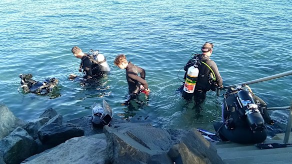 Elliot Peters says the monthly clean up is a social event that is a cheap dive while doing their part for the environment.