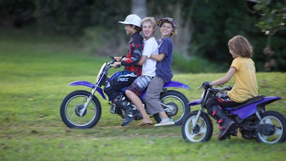 Heatley with her older brothers.