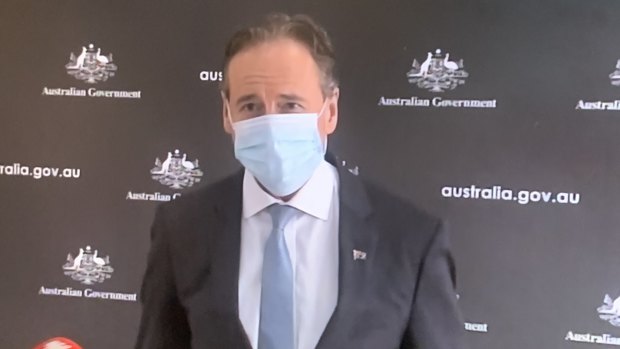 Health Minister Greg Hunt donned a face mask on Monday.