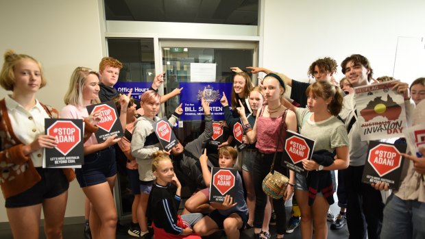 Young protesters outside Bill Shorten's office. His wavering on the Adani Carmichael coal mine has frustrated them.