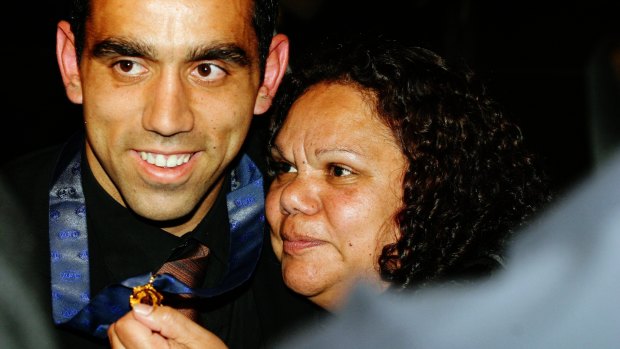 Goodes, with mother Lisa-May, collects his first Brownlow Medal in 2003.