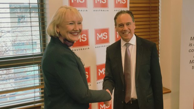 Deidre Mackechnie, the new co-chair of the Australian Patient Advocacy Alliance, with federal Health Minister Greg Hunt in 2018.