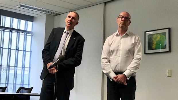 AAP chairman Campbell Reid (left) and chief executive Bruce Davidson  briefing staff of the closure last Tuesday.